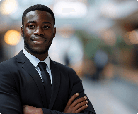 Professional in a suit standing with arms crossed