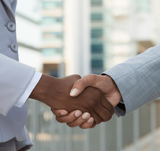 Business handshake representing a partnership with EarlyPay